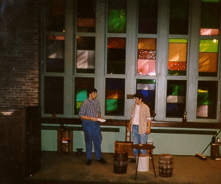 Andy Schoen as George talks to his new boss at the ranch, played by Ben Pawlowski.  Of Mice And Men, 1998
